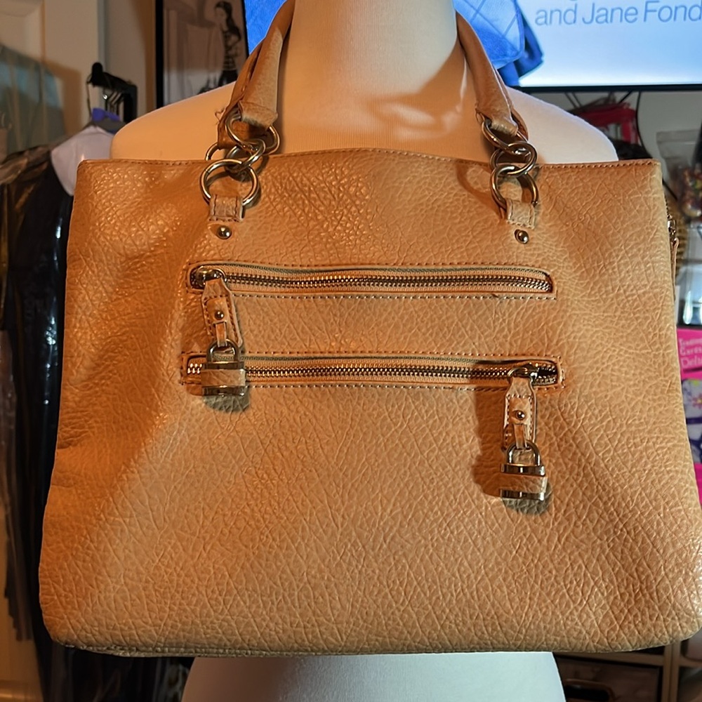 Tan Leather Handbag with 9 Different Pockets Including the Zipper Compartments
